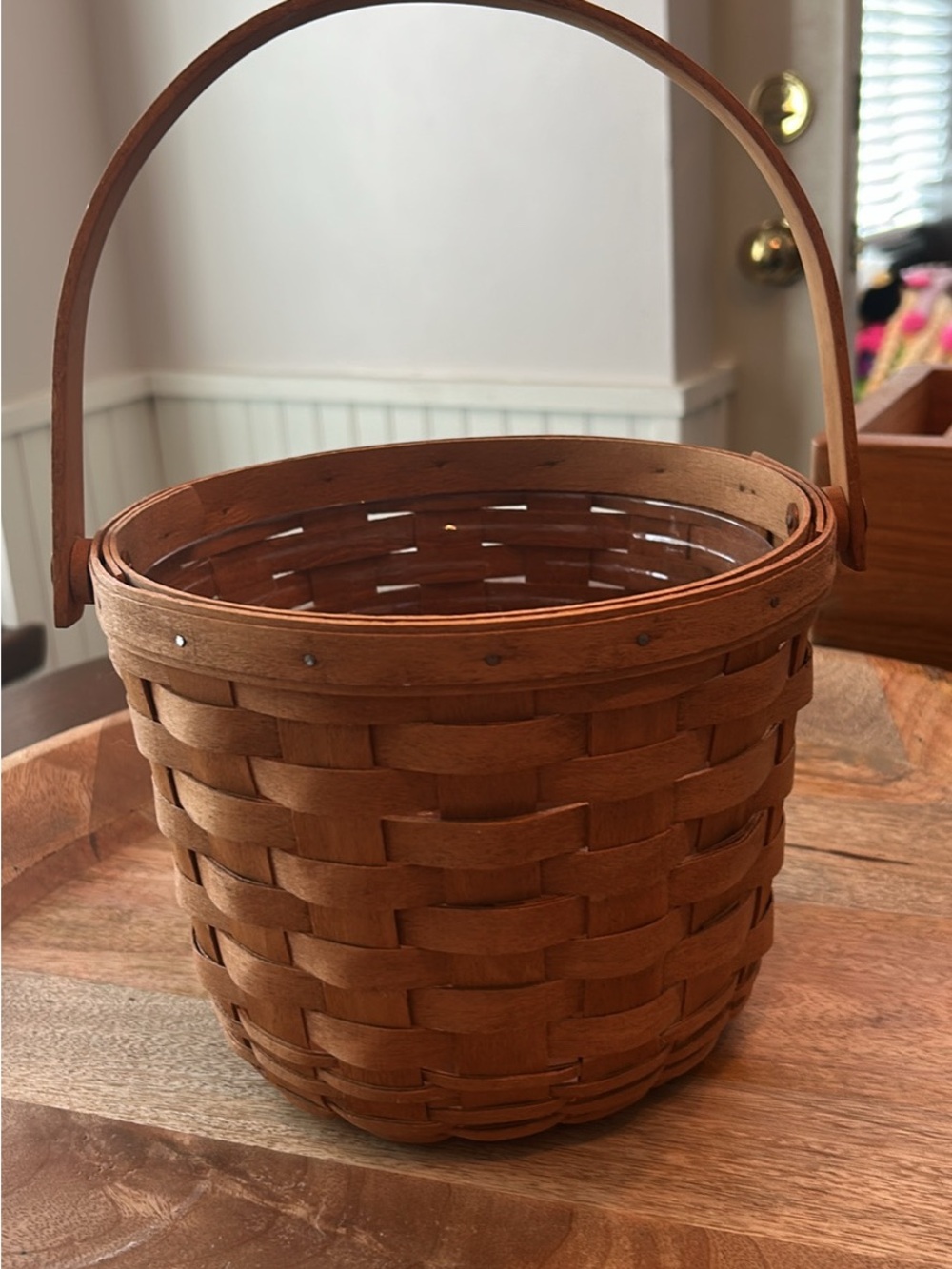 Longaberger Basket with Handle has liner 6 1/2 in tall without handle by 8 in